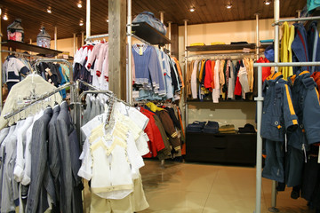 Obraz premium child clothes in shop