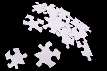 puzzle pieces on black