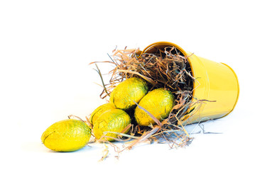 yellow bucket with yellow easter eggs