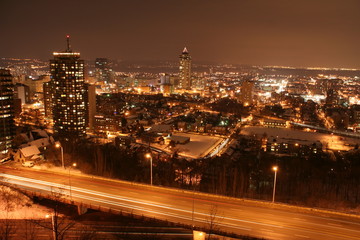 city lights at night time with a super high way of