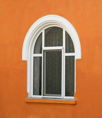 window on the yellow modern house