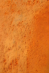 orange rusty pitted metal background