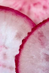 Photo sur Plexiglas Tranches de fruits tranches de radis gros plan extrême