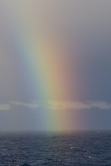 rainbow on open ocean