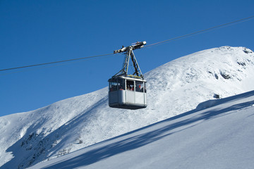 Fototapeta na wymiar cabin lift with blue skye in background