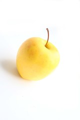 yellow apple over white background