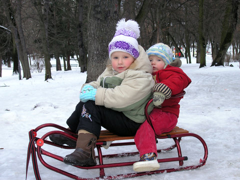 childrens on sledge