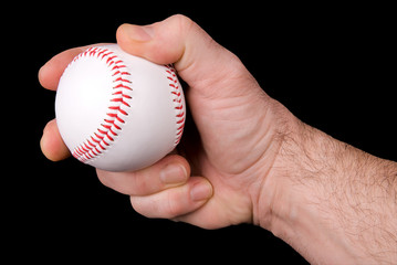 hand holding a baseball