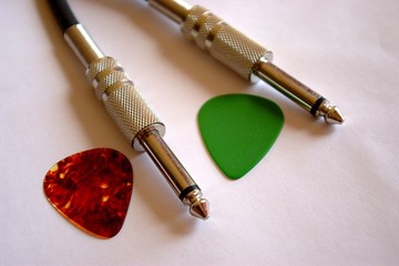 guitar picks and cable