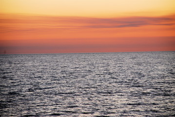 sunset over rippling water