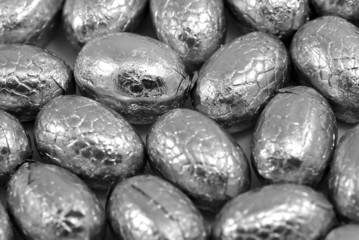 collection of silver easter eggs as a background