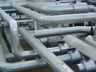 Foto op Plexiglas Industrieel gebouw industrial pipes and structures