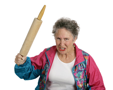 angry senior lady with rolling pin