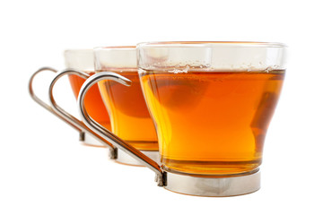 three glass cups of tea