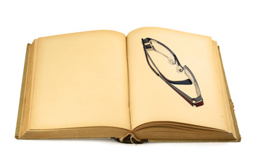 old book with glasses