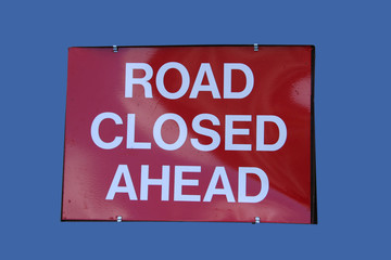 red road closed sign