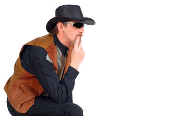 attractive cowboy with glasses, pensive look