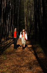 Fototapeta premium girls walking in the forest
