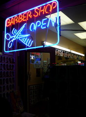 barber shop with neon sign