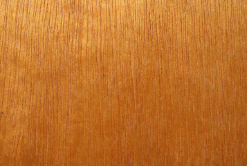 abstract orange stained wood grain texture.