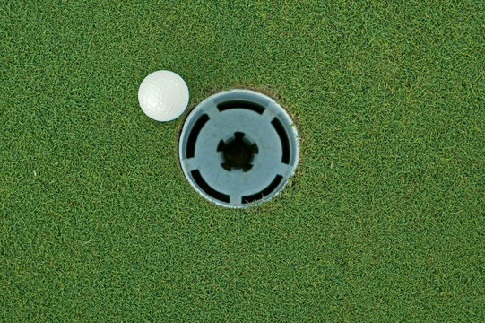 golf ball and hole