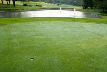 golf green and water hazard