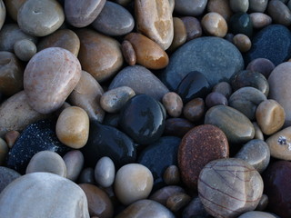 Fototapeta na wymiar beach pebbles and rocks iv