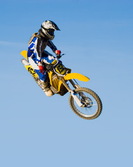 high flying motorcycle - yellow © Robert Kelsey