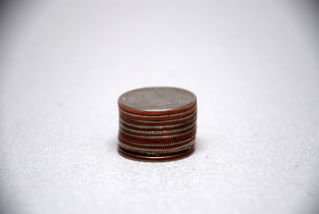 stack of quarters on a white background