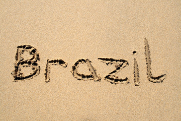 brazil, written on a sandy beach.