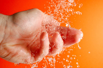 hand and running water