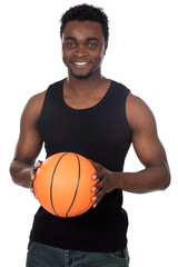 attractive young person with basketball ball