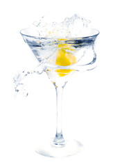 splashing fruit into a martini glass