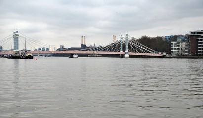 thames river and royal albert bridge and buildings