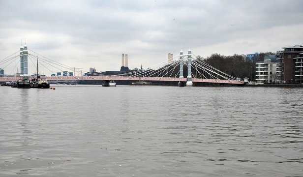 Thames River And Royal Albert Bridge And Buildings