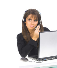 smiling businesswoman sitting at computer.