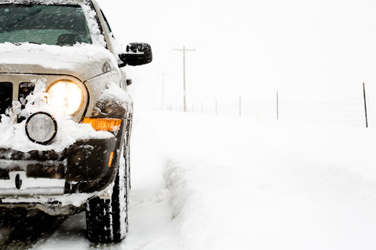 Suv In Snow