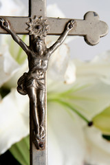 cross and easter lilies