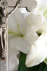 cross and easter lilies