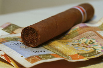 cigar and money