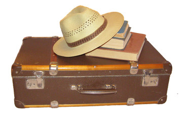 suitcase, hat and books