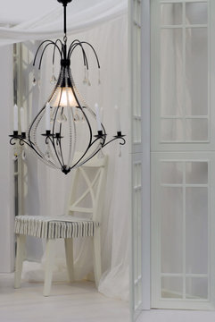 Chandelier In White Interior