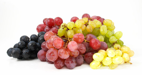 three various grades of grapes