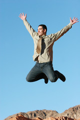 ecstatic businessman jumping