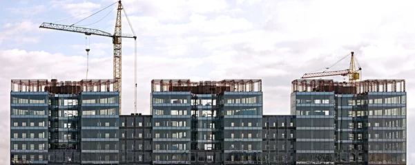 Photo sur Plexiglas construction de la ville modern office building house construction downtown