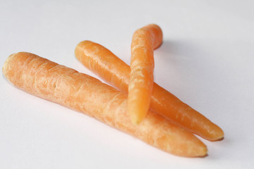 three small carrots