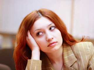 portrait of girl with reddish hair in office #2