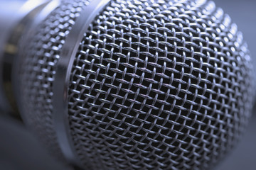 blue-toned microphone head (grille)
