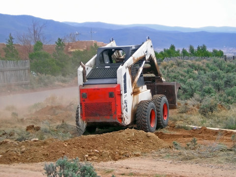 Loader Clearing Land - Widening Driveway