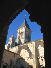 french church with pillars in backlight, france